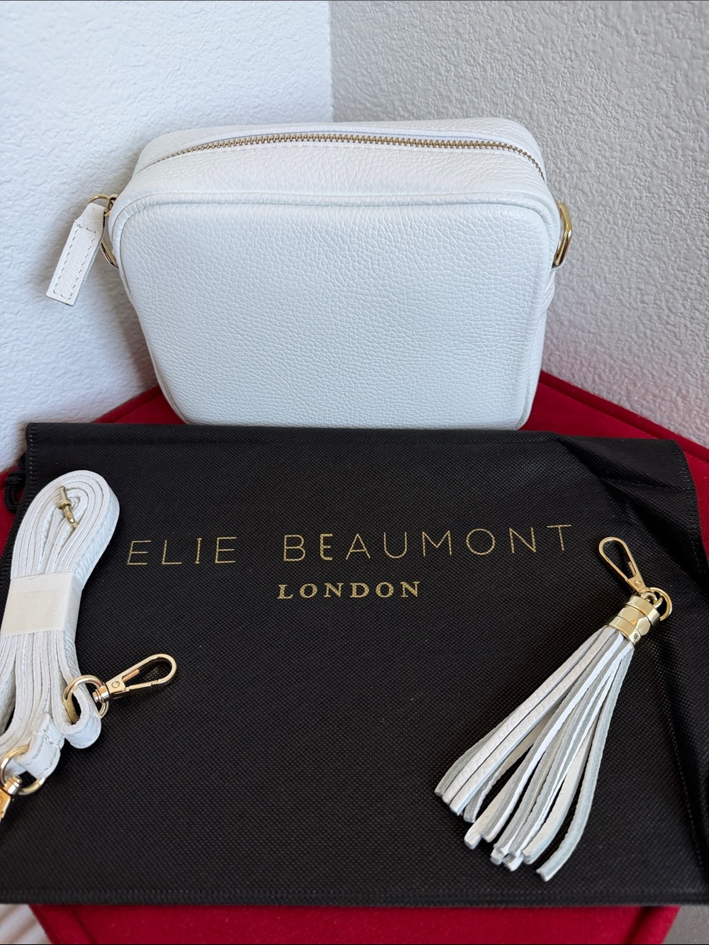 Elie Beaumont London White Leather Crossbody Bag with Shoulder Strap & Tassel.